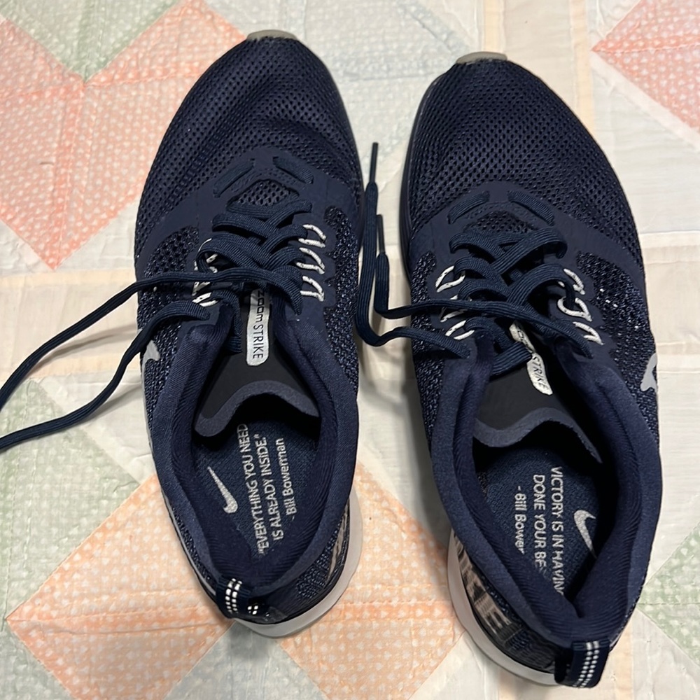 Nike Blue tennis shoes zoom strike . Only wore once
